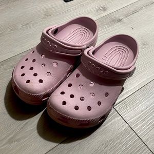 Used pink crocs in kids size. 6J